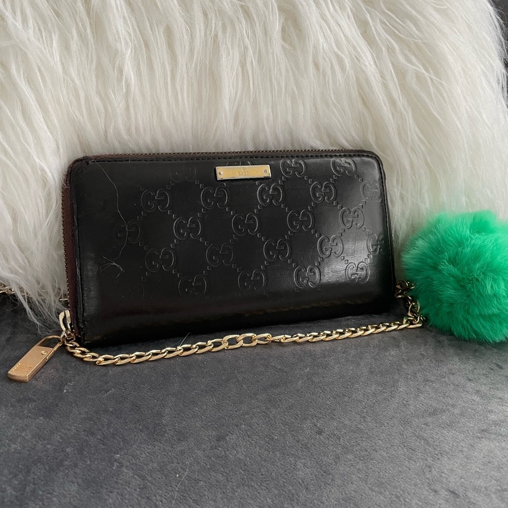 Gucci brown monogram crossbody wallet